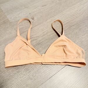 Cream Triangle Bra with Seamless Design and Adjustable Straps